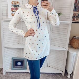 Living Doll long sleeve collared bird tunic top
